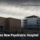 Fostoria News Construction of a new psychiatric hospital in Toledo with scaffolding and crane.